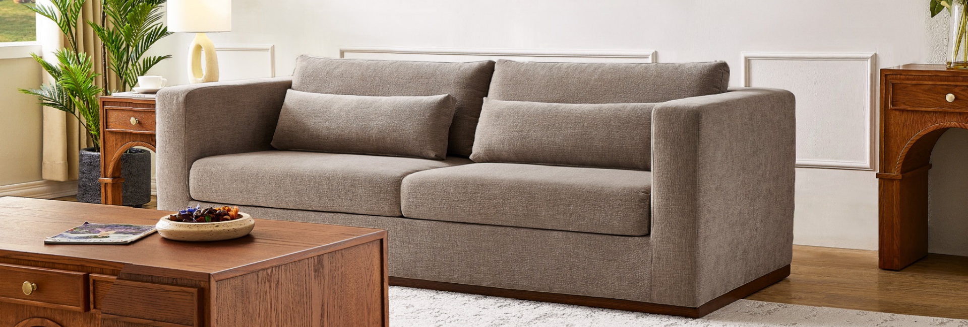 This deep couch offers a 31.5" seat depth for relaxed lounging, styled with lumbar pillows.