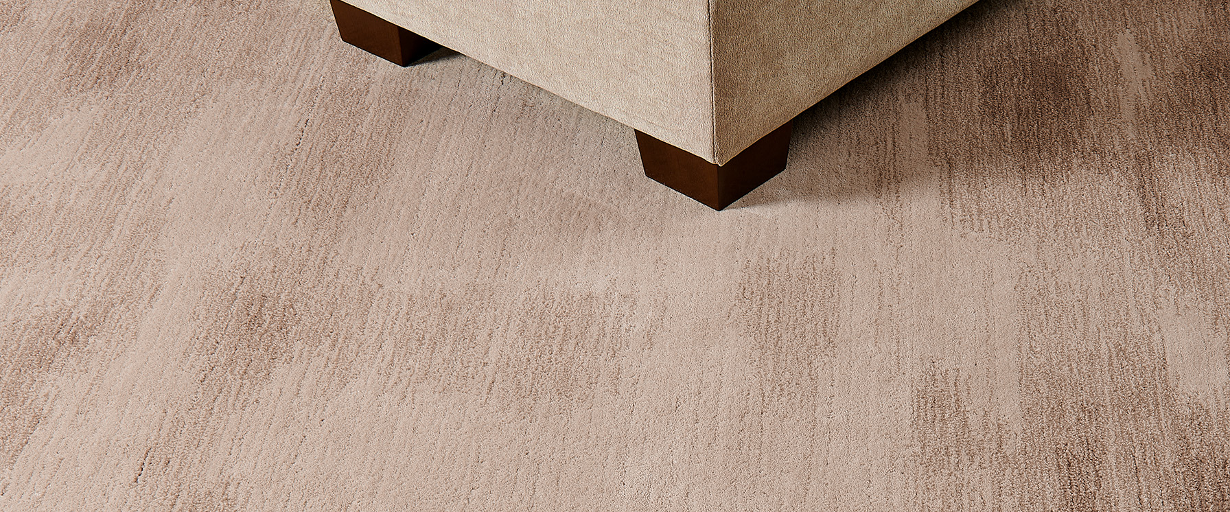 High density hand-knotted 100% wool area rug.