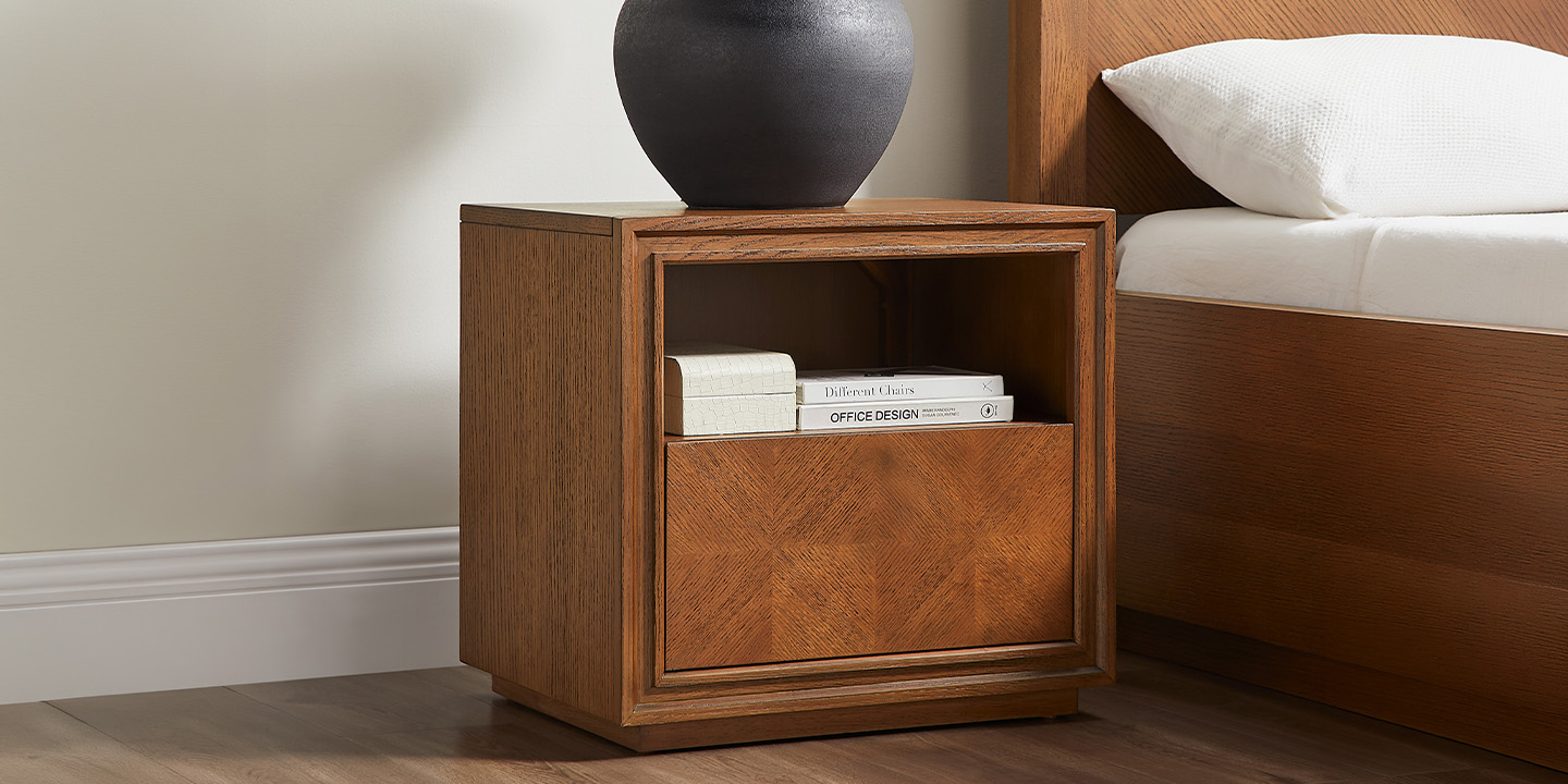 Modern nightstand: Thursen chevron-patterned wooden end table with an open shelf and drawer.
