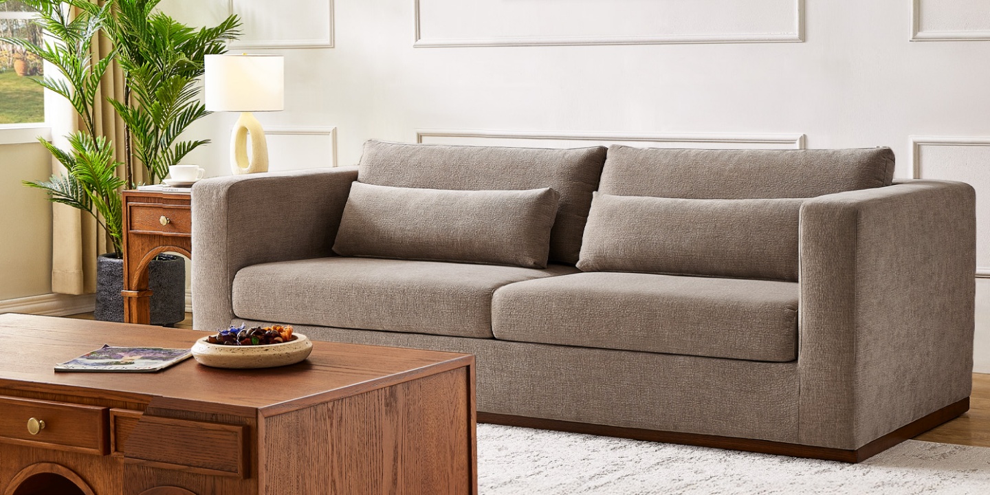 Alba sofa featuring a 91-inch width for a perfect couch size, designed with wide armrests and lumbar pillows on a solid oak wood plinth. Alba sofa featuring a 91-inch width for a perfect couch size, designed with wide armrests and lumbar pillows on a solid oak wood plinth.