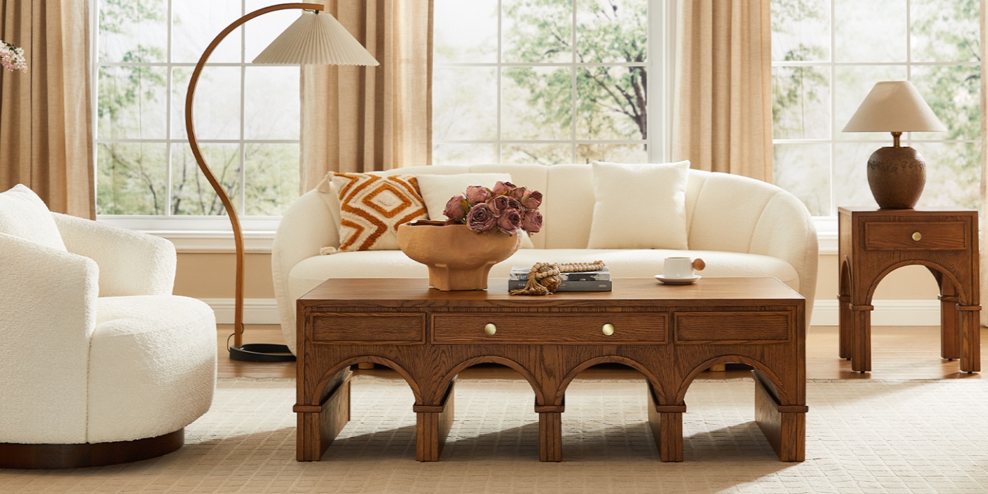 Solvind 55 inch Coffee Table with storage featuring elegant arched wooden base design and gold metal handles in a warm living room interior