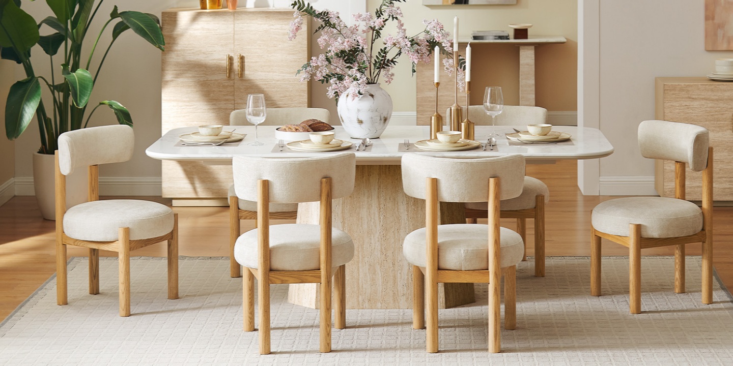 84-inch dining room table for 6 crafted of engineered stone, resin and plywood with American oak veneers. and a sculptural, travertine-textured trapezoidal base