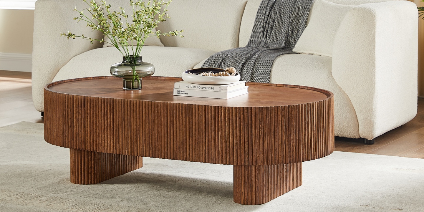 A styled Marisol 55 inch Oak Coffee Table brings natural wood textures into this tranquil feng shui living room.