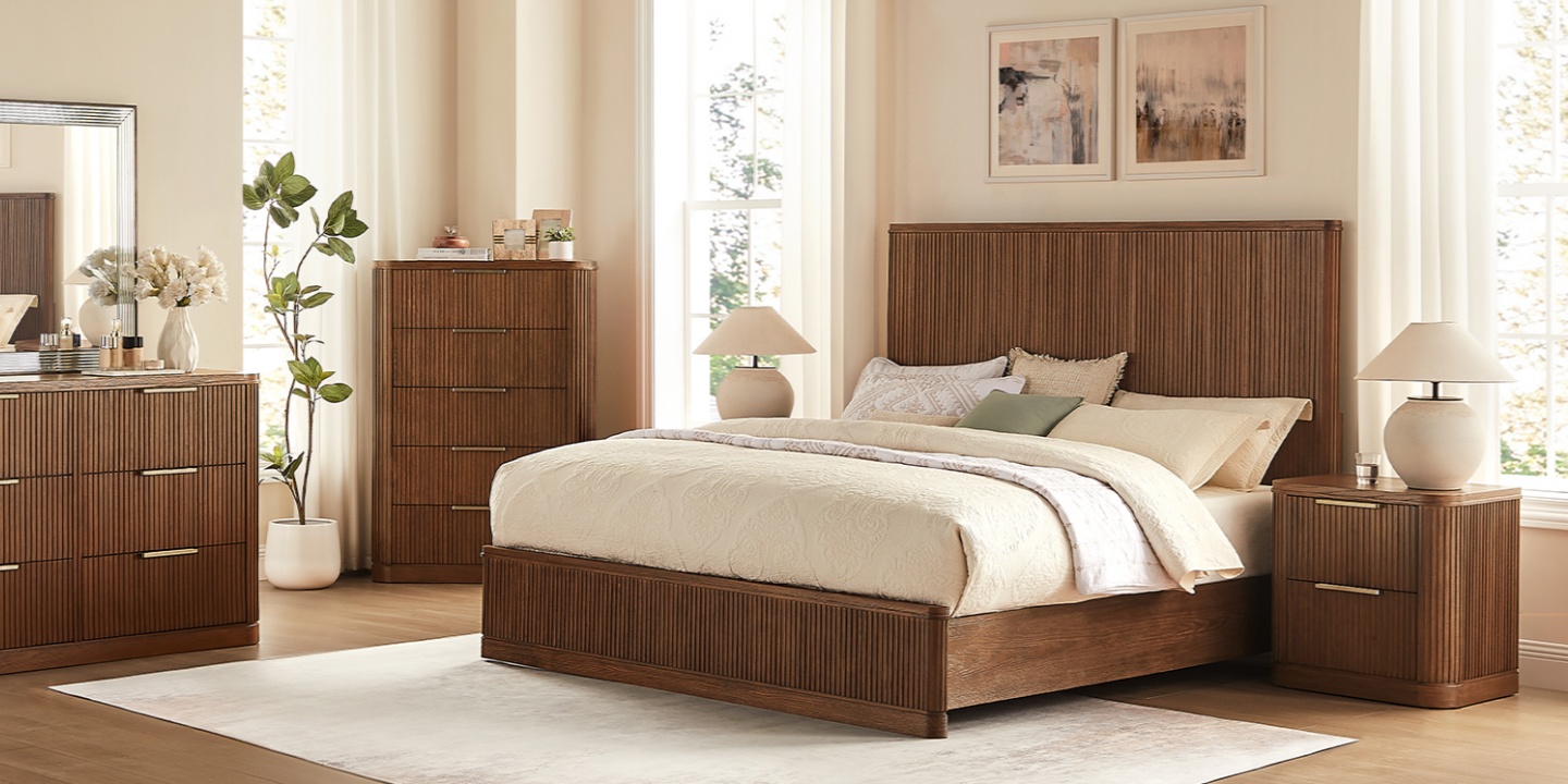 The Finnley 26" Fluted Nightstand, showcased in a modern bedroom, features a striking vertical fluted design and a precise 26.2-inch nightstand height for optimal bedside functionality.