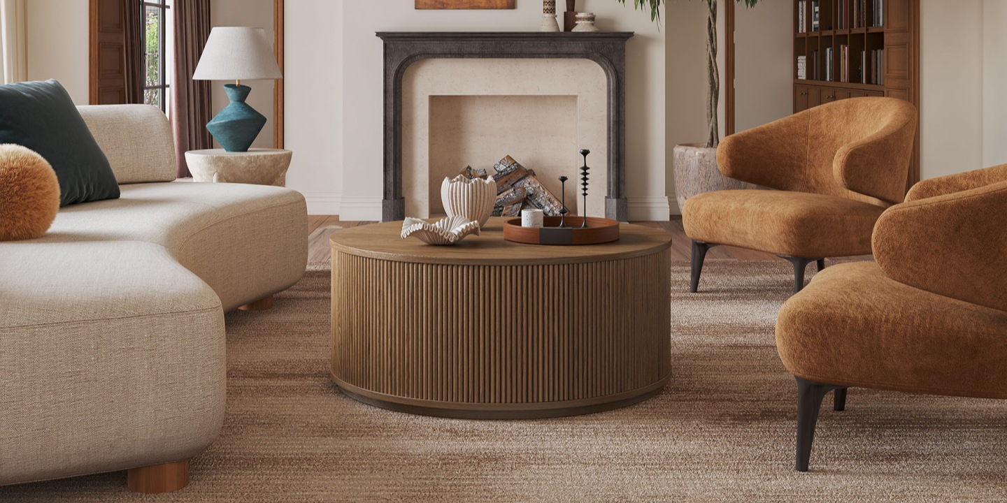 Rolf 42.1" round coffee table crafted from American solid oak and engineered wood with oak veneers with fluted detailing.