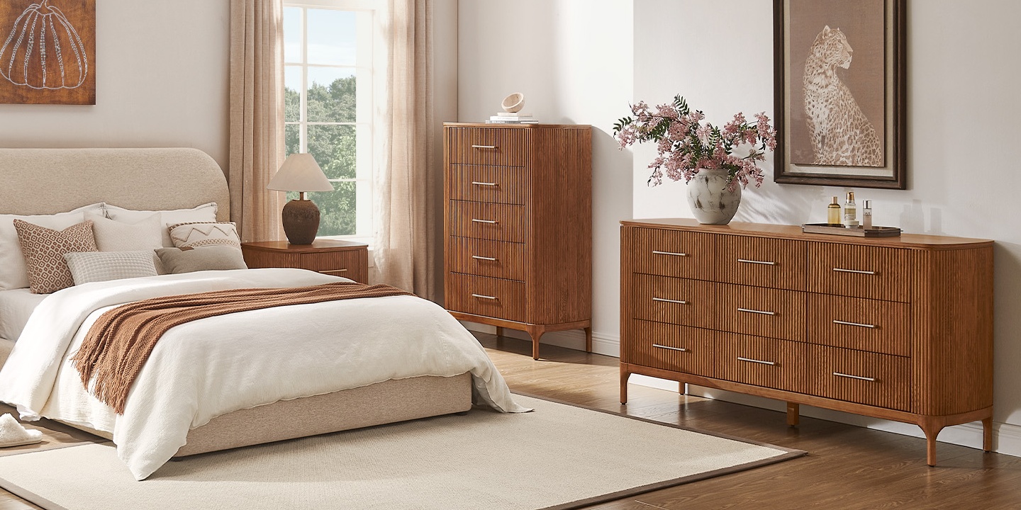 A 70-inch Skugga Oak 9-Drawer Dresser sits in a modern bedroom, showcasing its average dresser size.