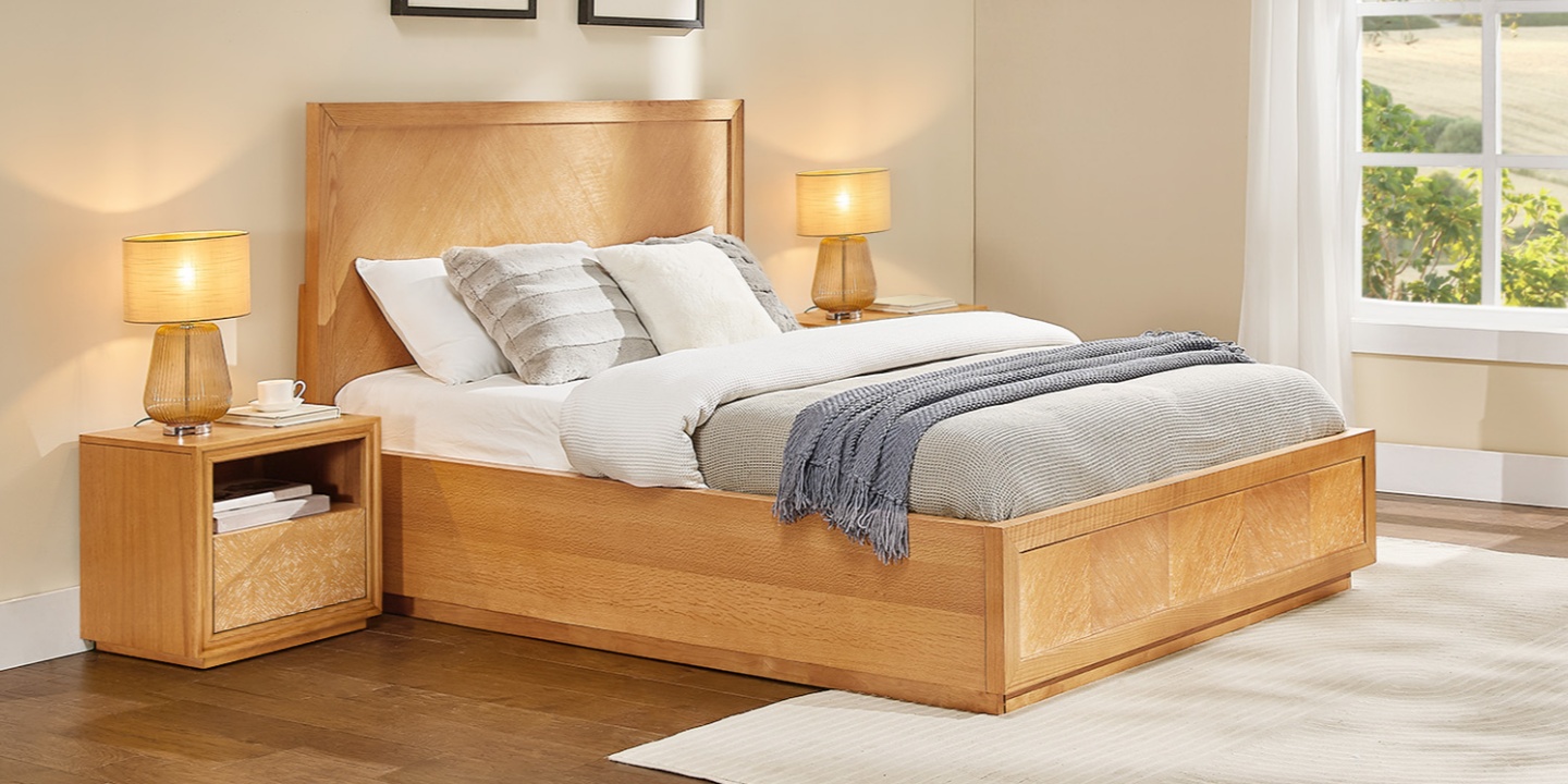 The Thursen nightstand, showcasing intricate geometric wooden grids and a wire-brushed finish, provides an ideal 20-inch nightstand height for modern bedroom decor.
