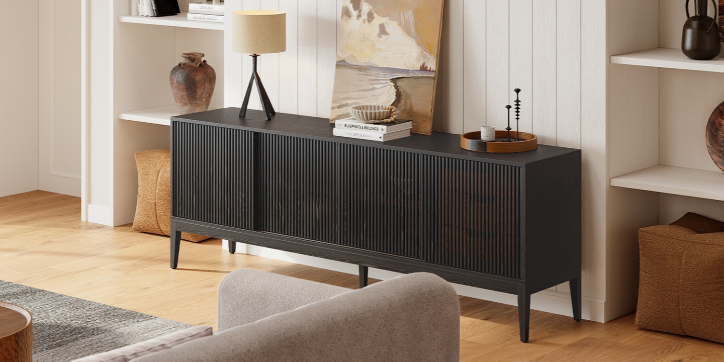 Astrid black slatted media console featured among the best tv stands, styled in a modern living room with minimalist decor. Astrid black slatted media console featured among the best tv stands, styled in a modern living room with minimalist decor.