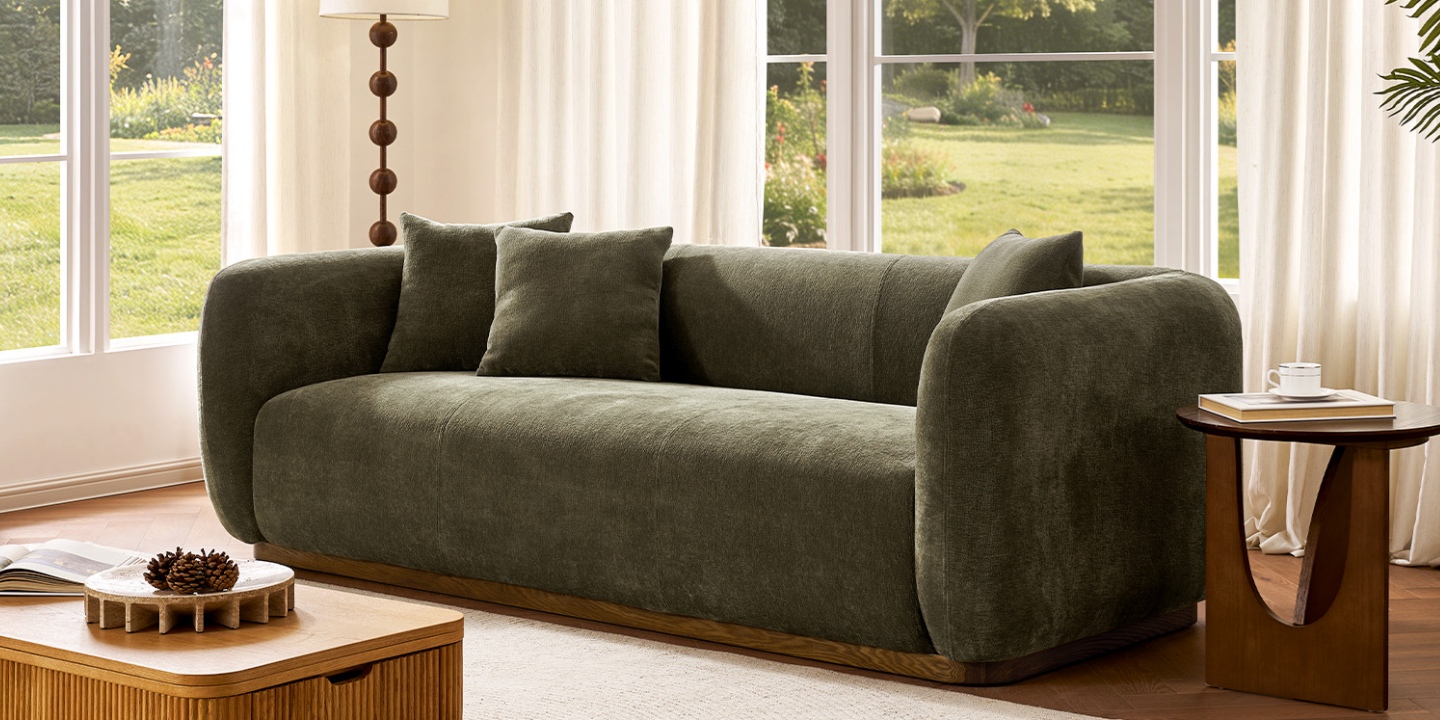 Featuring a 28.1" seat depth, this deep couch provides cozy lounging with rounded arms in a sunlit living room. Featuring a 28.1" seat depth, this deep couch provides cozy lounging with rounded arms in a sunlit living room.