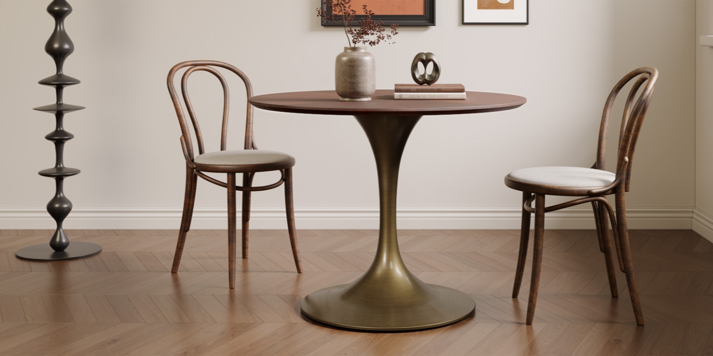 Estelle 42" round dining table featuring a unique sculptural trumpet base and rich wood top in a warm dining space. Estelle 42" round dining table featuring a unique sculptural trumpet base and rich wood top in a warm dining space.