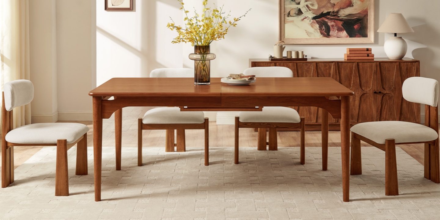 The Kaden 72"-92" extendable dining table with tapered legs brings mid-century charm to this warm dining room. The Kaden 72"-92" extendable dining table with tapered legs brings mid-century charm to this warm dining room.