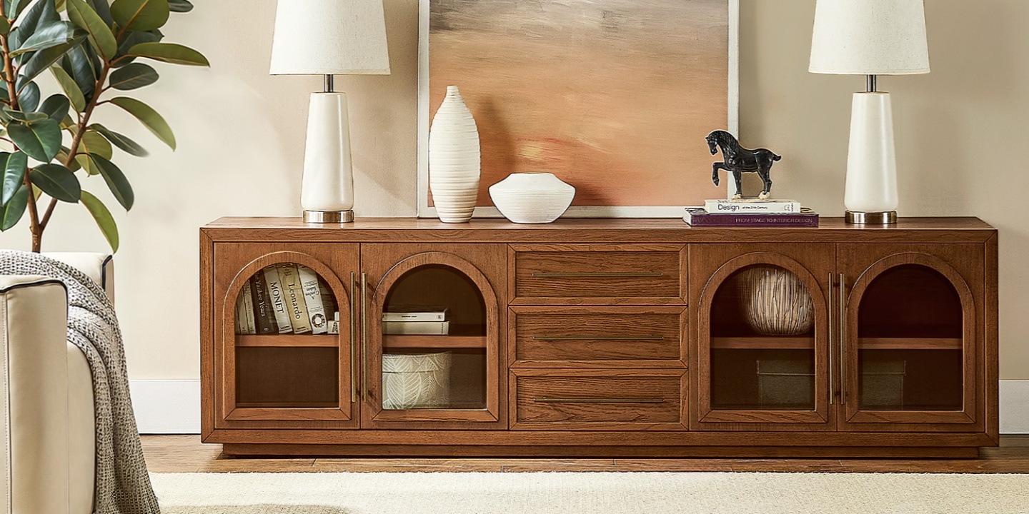 Furniture for Philadelphia homes featuring the Lira 84 inch oak media console with arched glass doors, central drawers, and handles. Furniture for Philadelphia homes featuring the Lira 84 inch oak media console with arched glass doors, central drawers, and handles.