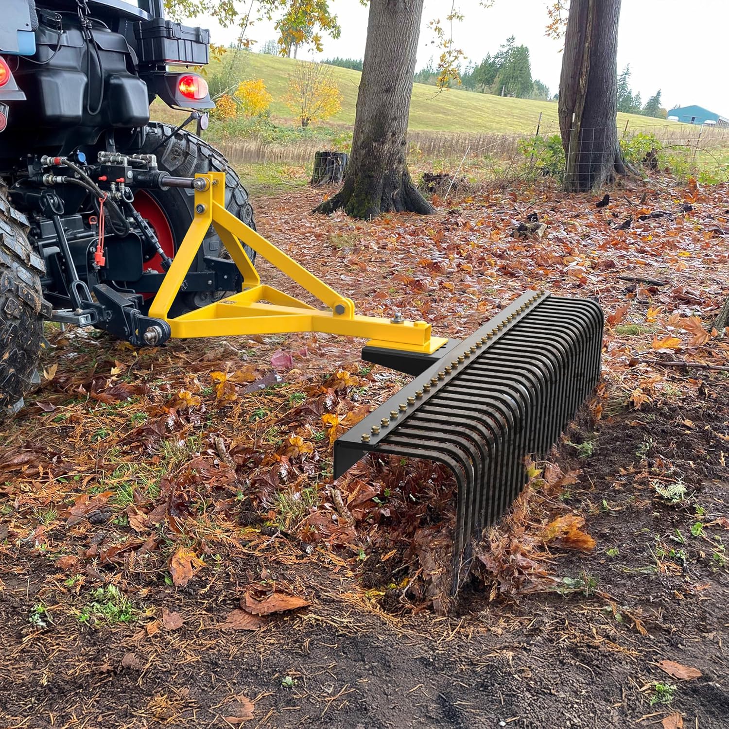 Side view of YITAMOTOR 5 FT 3 Point Landscape Rock Rake for Category 1 Tractors | 360° Rotation, 32 Replaceable Teeth