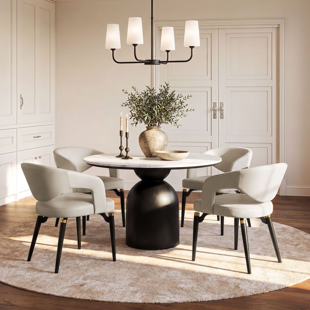 Orange DinTwo modern beige Hernest Liliana Armrest Leather Dining Chairs with curved backs and gold-accented black legs, shown together.ing Chair Set