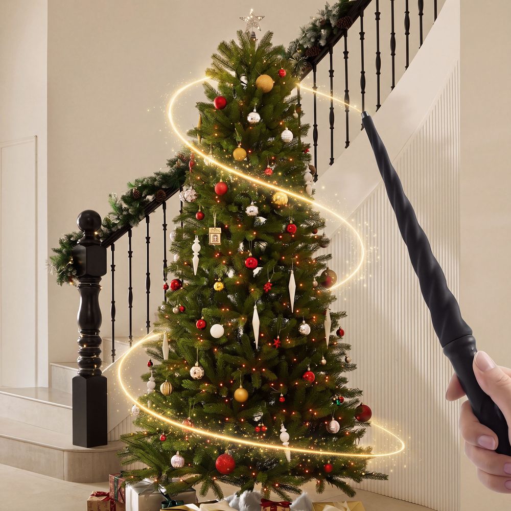Using the magic wand to control lights on the decorated CastGlow 7.5 ft pre-lit slim green Christmas tree. - image 2 of 14