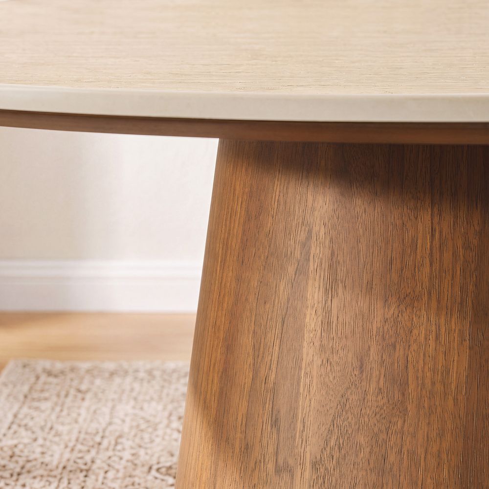 Close-up showcasing the connection between the beige sintered stone tabletop and the wood base of the Thorsten table. - image 4 of 7