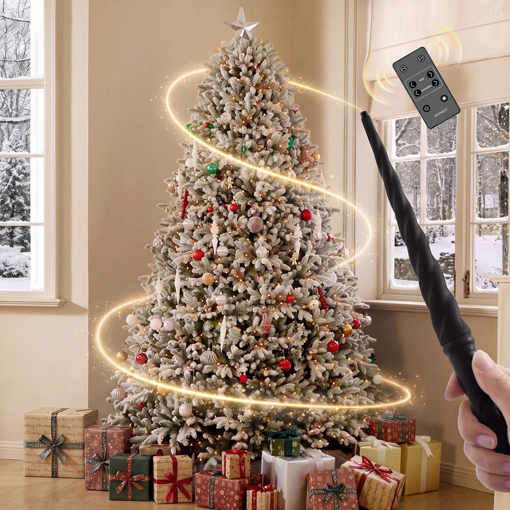 Person using a magic wand to control the lights on a fully decorated flocked artificial Christmas tree. - image 2 of 14