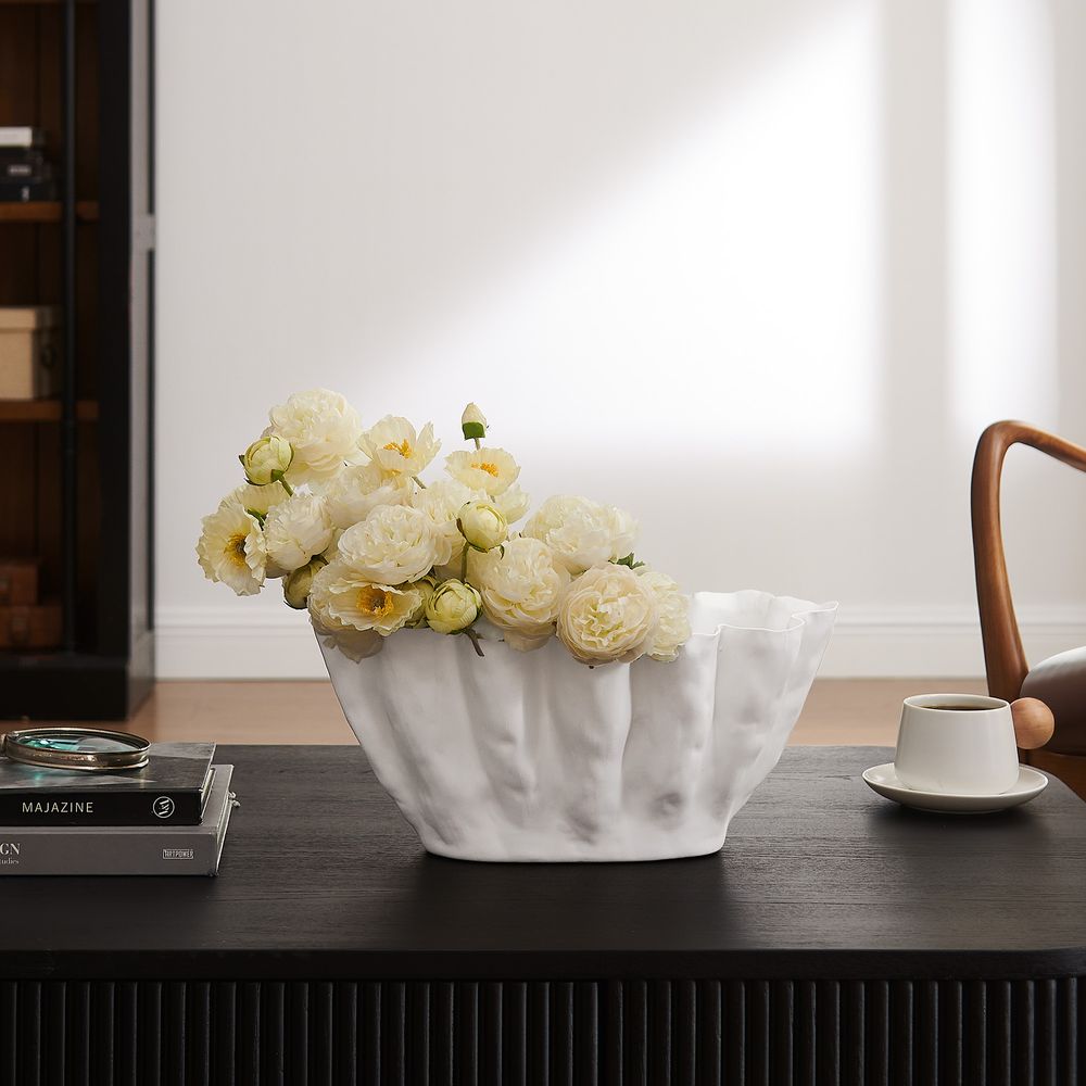 white ceramic vases blooming