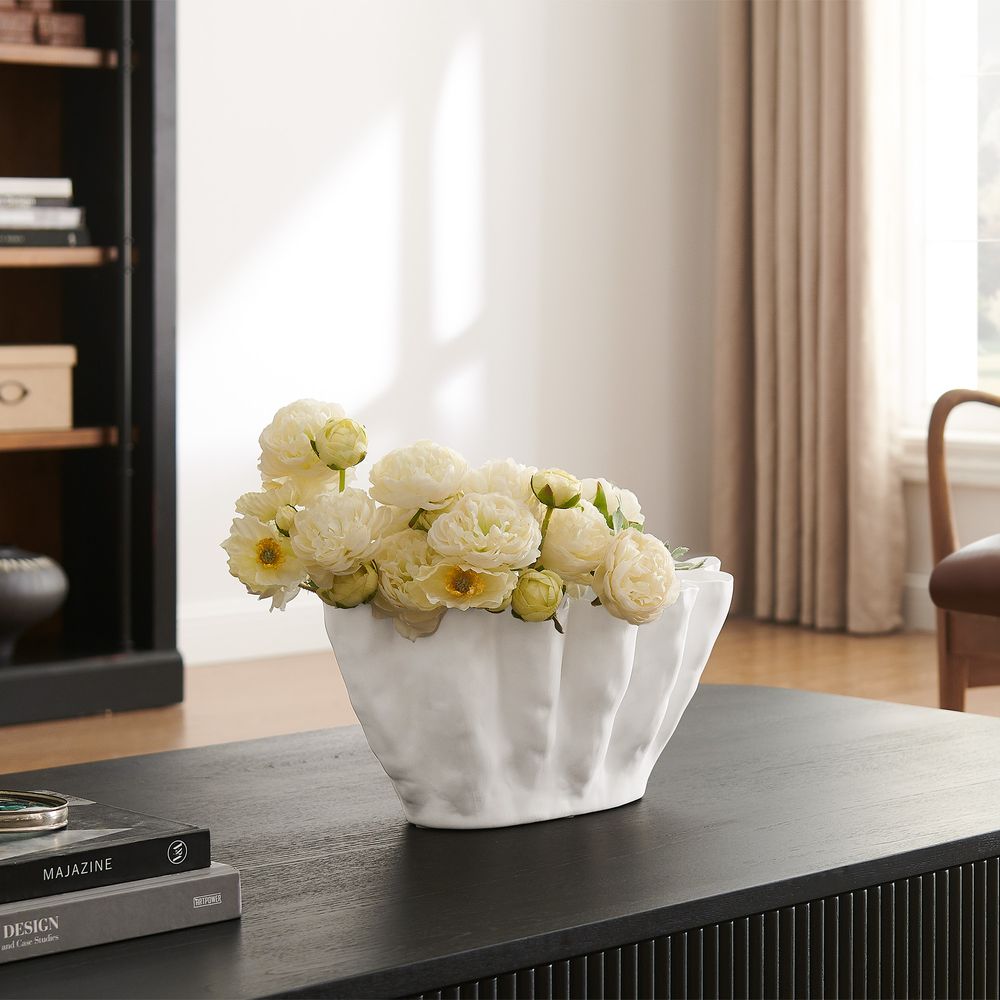 white ceramic vases blooming