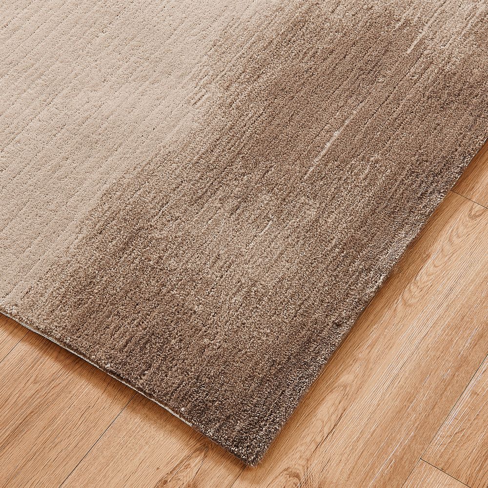 dark brown hand-knotted wool area rug