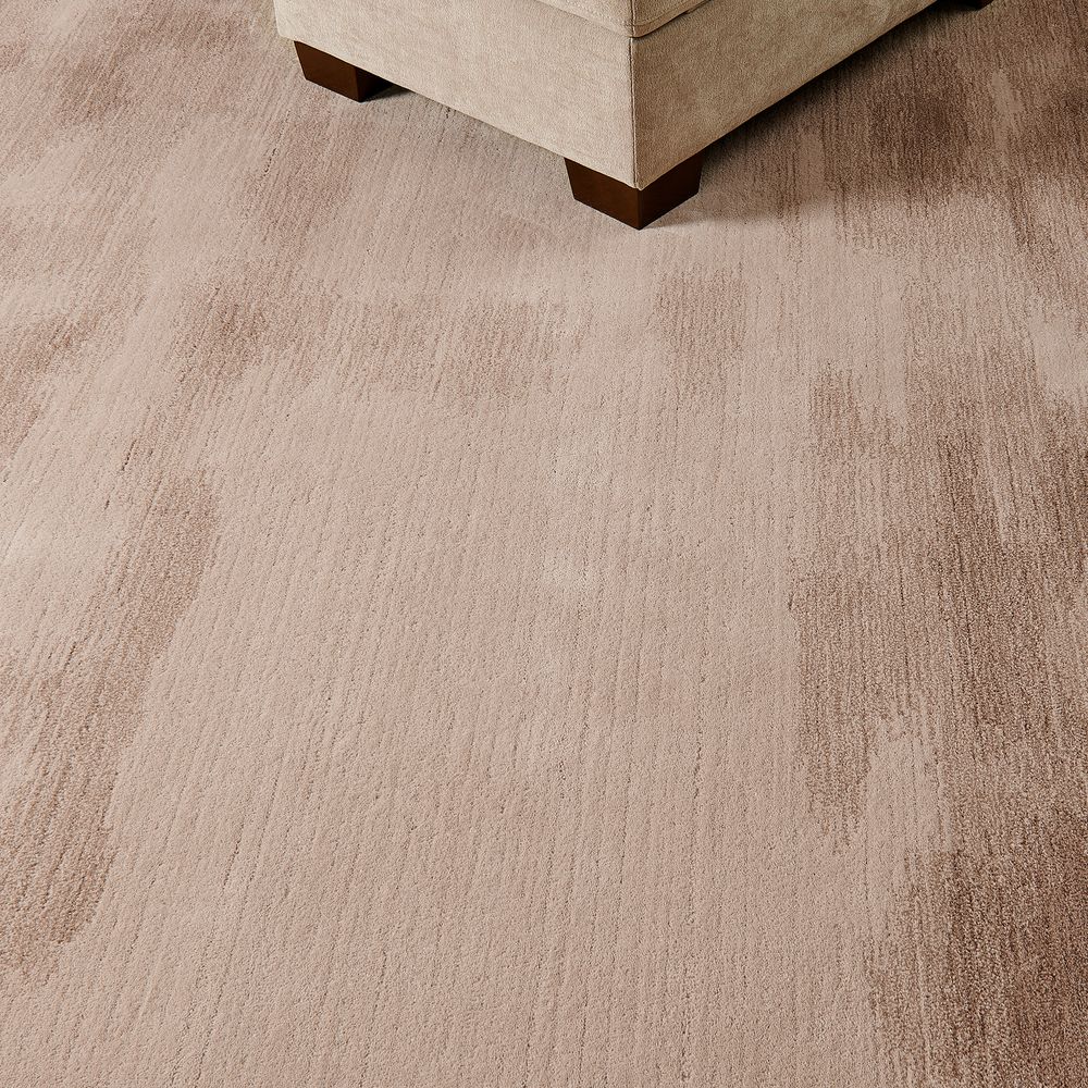 dark brown hand-knotted wool area rug