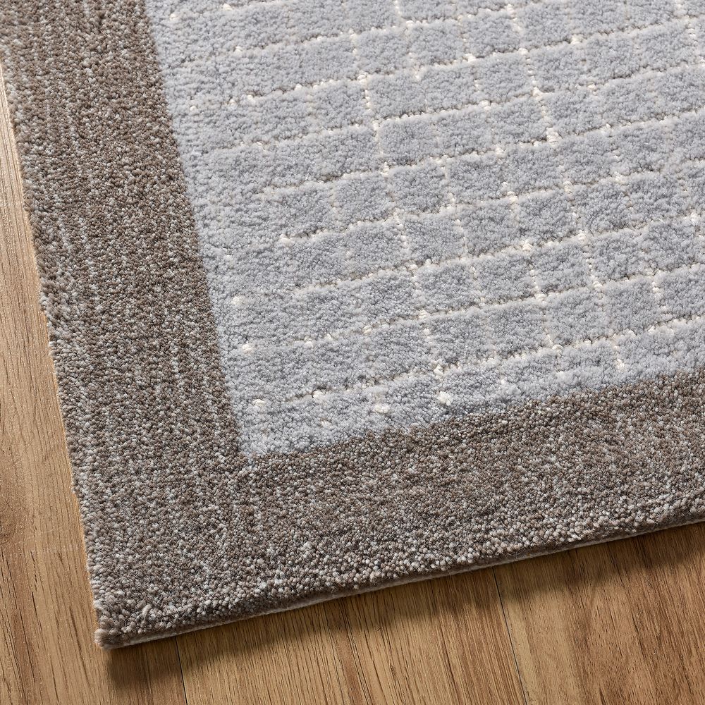 100% wool hand-woven rug grid pattern
