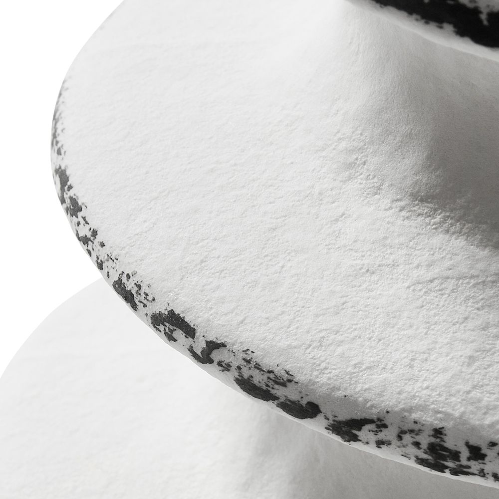 white ceramic candleholder