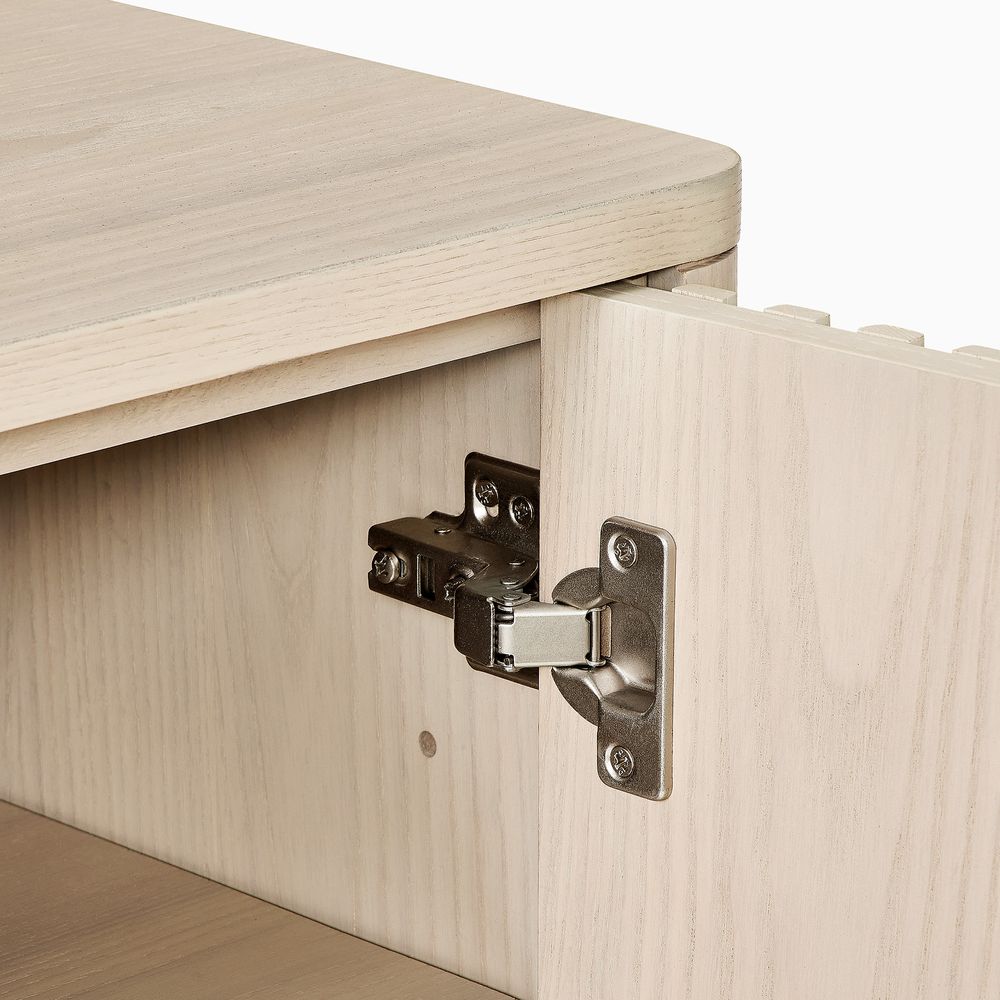 Hardware details at the shoe cabinet's connecting doorway