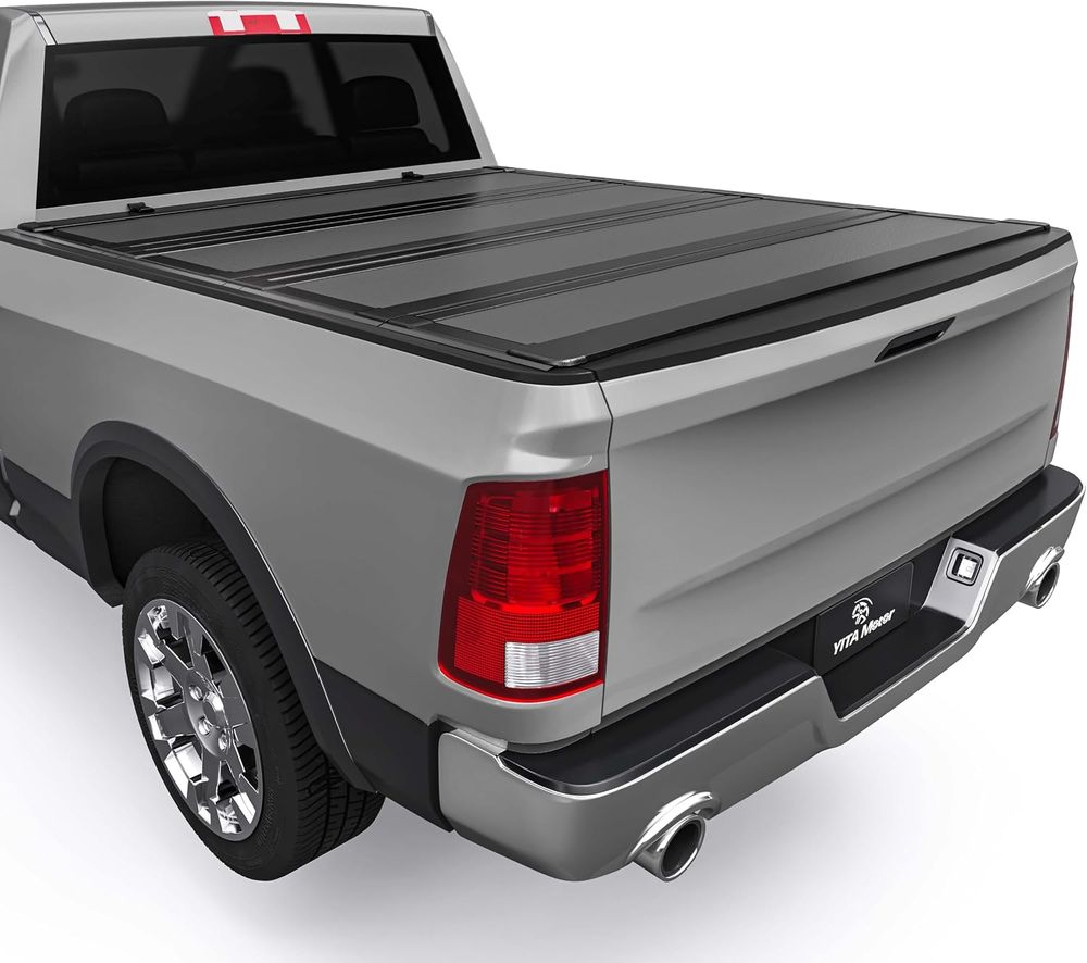 YITAMOTOR tonneau cover, YITAMOTOR truck bed cover, Ram 1500 tonneau cover, Dodge Ram 1500 tonneau cover, 2019-2026 Ram 1500 tonneau cover, 2019 Ram 1500 bed cover, 2020 Ram 1500 bed cover, 2021 Ram 1500 bed cover, 2022 Ram 1500 bed cover, 2023 Ram 1500 bed cover, 2024 Ram 1500 bed cover, 2025 Ram 1500 bed cover, 2026 Ram 1500 bed cover, Ram 1500 5.7 ft bed cover, Ram 1500 5.7' bed tonneau cover, Ram 1500 New Body Style tonneau cover, Ram 1500 hard tonneau cover, Ram 1500 hard quad-fold tonneau cover, hard quad-fold truck bed cover, quad-fold tonneau cover, low-profile tonneau cover, low profile hard tonneau cover, folding truck bed cover, weather-resistant tonneau cover, truck bed cargo cover, pickup bed cover, Ram truck bed cover, no Rambox tonneau cover, Ram 1500 without Rambox, 3/4 bed access tonneau cover, tool-free tonneau cover, one-hand latch tonneau cover, scratch-resistant truck bed cover, UV-resistant tonneau cover