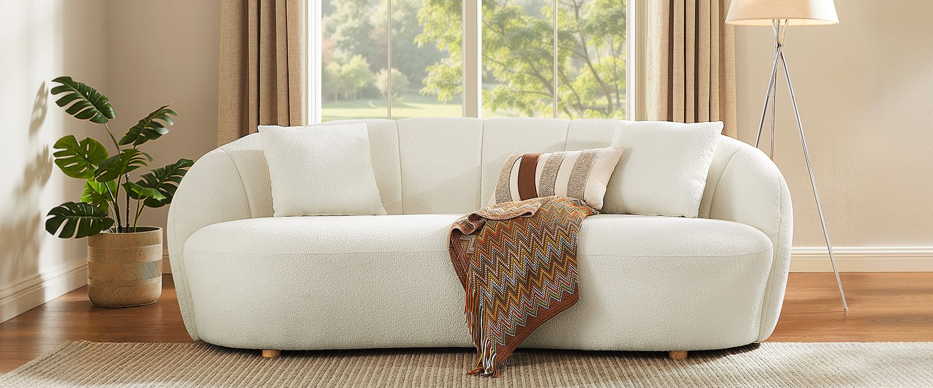 white curved loveseat 