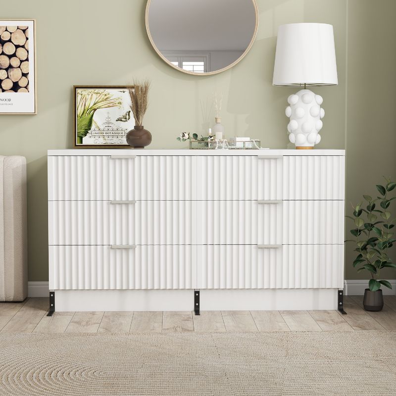 Front view of white dressers