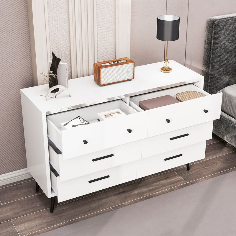Overhead display of white bedroom dressers in the bedroom