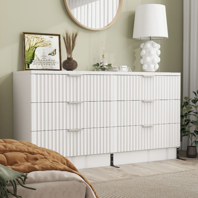 Side view of white dressers