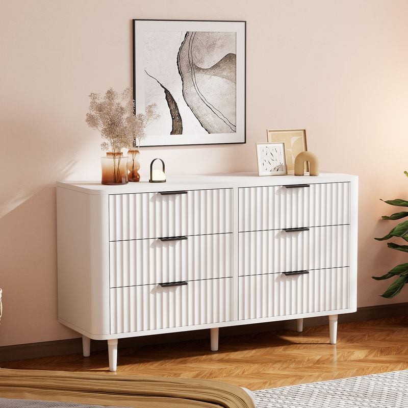Side view of the white glossy wave design dresser