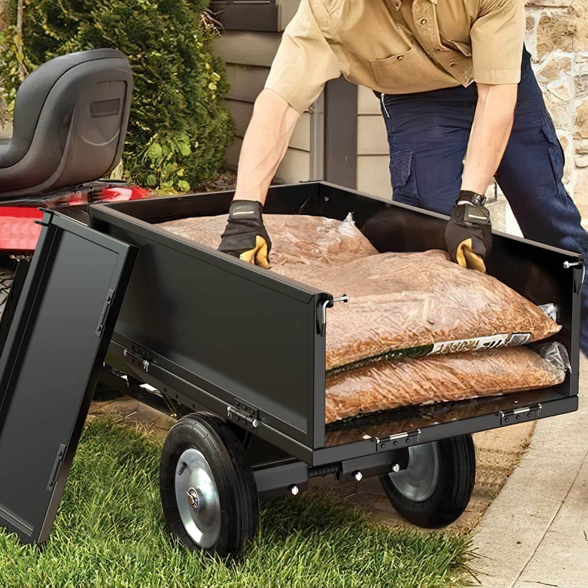 Side view of YITAMOTOR® 10 Cubic Feet Dump Cart Steel Dump Trailer 成功