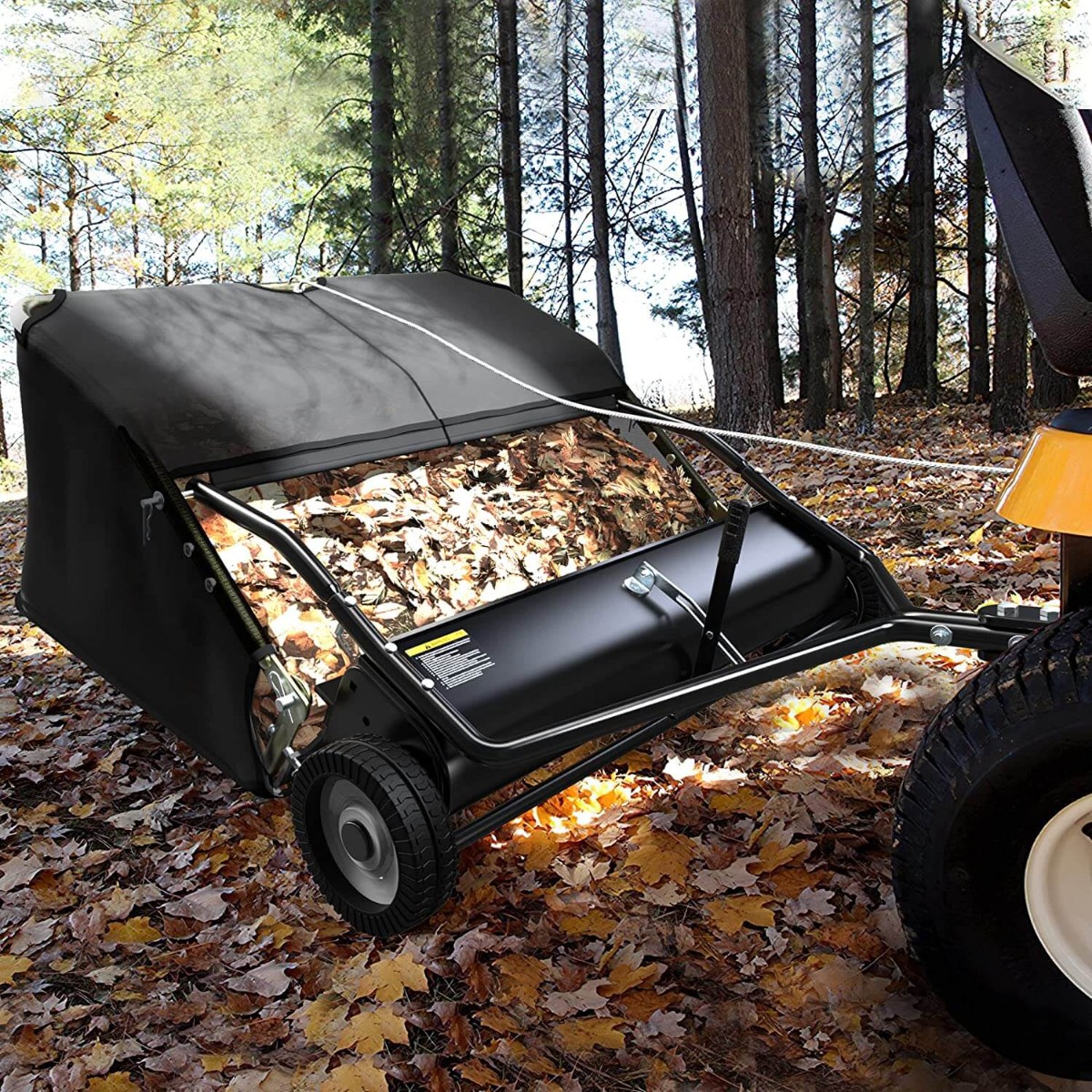 Side view of YITAMOTOR® 48" Tow Behind Lawn Sweeper Leaf Collector Sweeper for Lawn