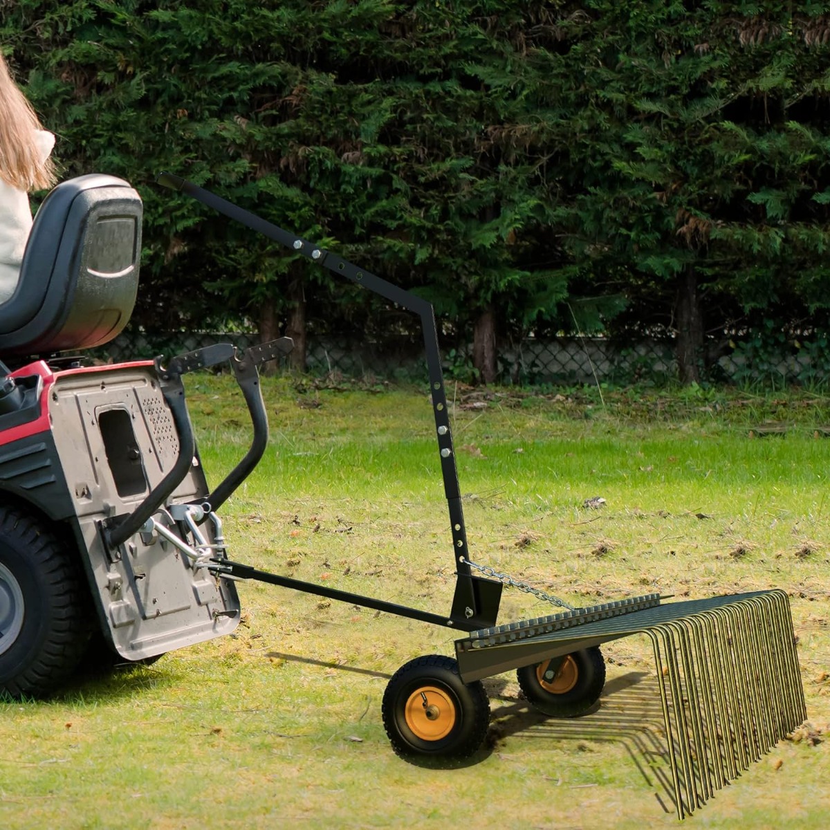 Side view of YITAMOTOR® 60" ATV Tow Behind Lawn Rake Durable Corrosion Resistant Steel Pine Straw Rake