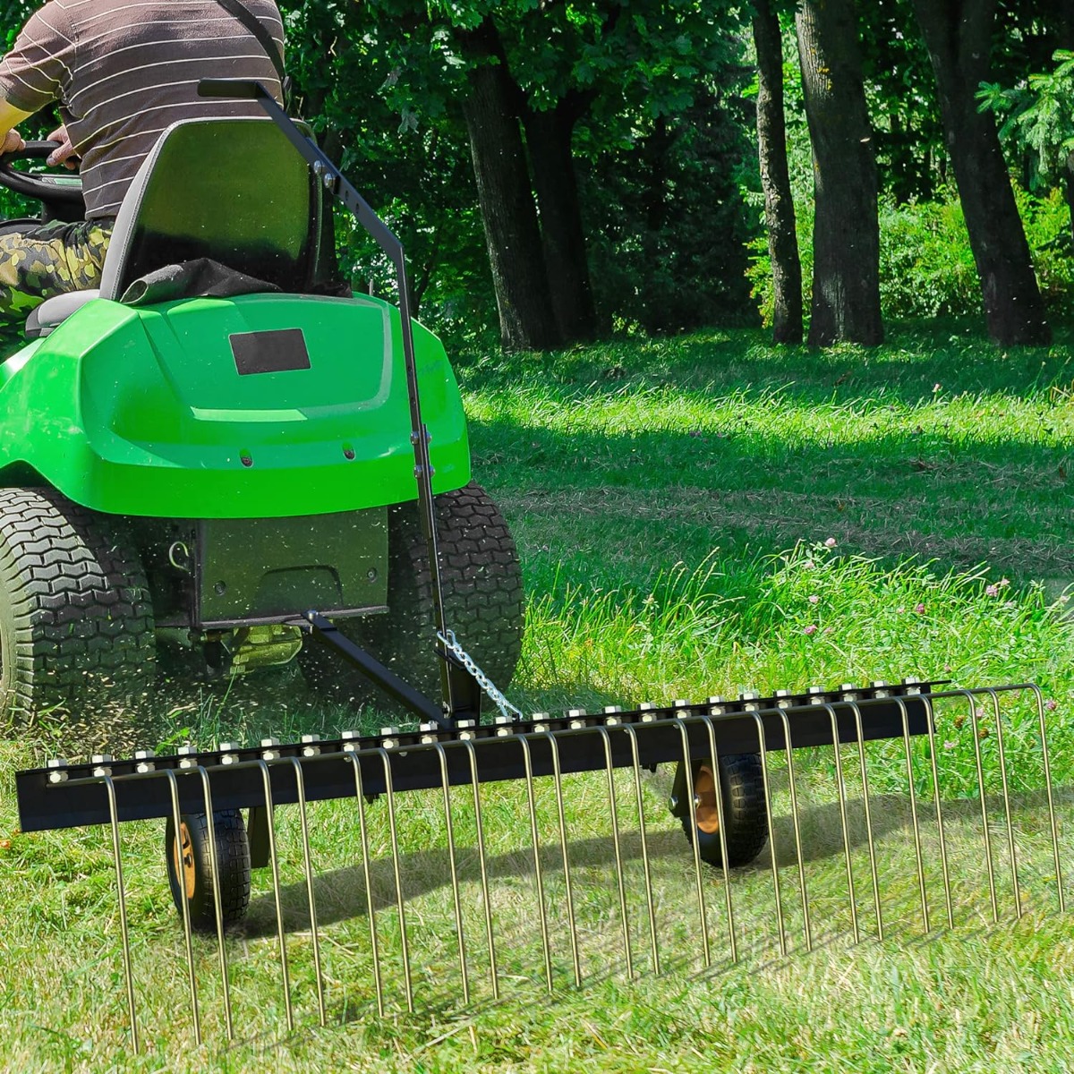 Side view of YITAMOTOR® 60" ATV Tow Behind Lawn Rake Durable Corrosion Resistant Steel Pine Straw Rake