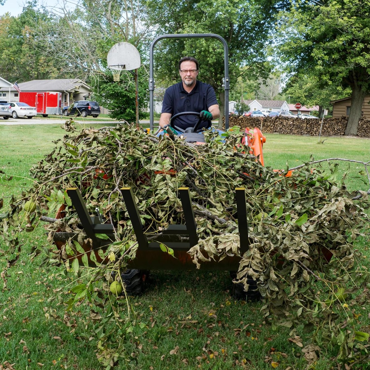 Side view of YITAMOTOR 42" Clamp-On Debris/Pallet Forks, 2500 lb Capacity | Fits Loader Buckets for Skid Steer & Tractor
