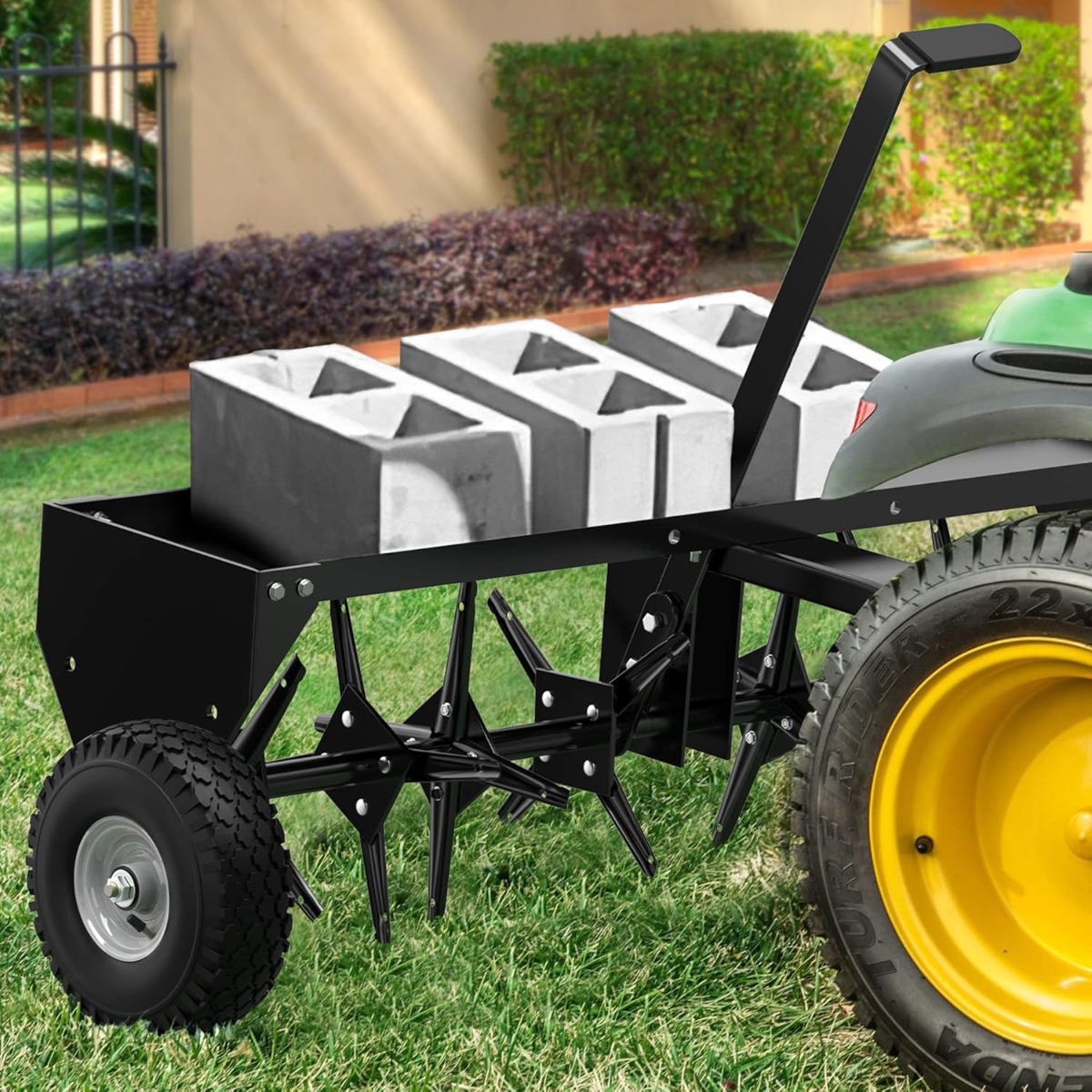 Side view of YITAMOTOR® 48" Tow Plug Lawn Aerator with Universal Hitch,Black